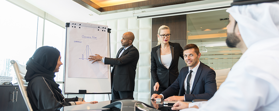 Business meeting with presentation in modern office.