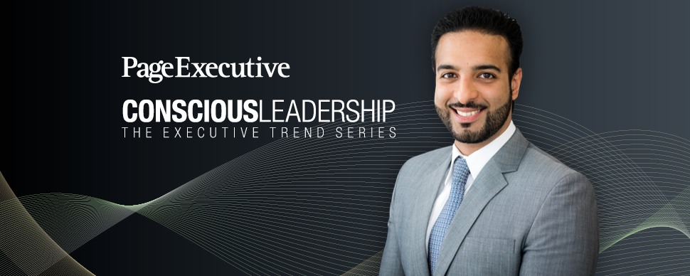 Man in suit smiling next to text 'Conscious Leadership' on dark background.