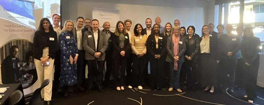 a group of people in a conference