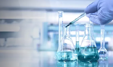 test tubes with a laboratory in the background