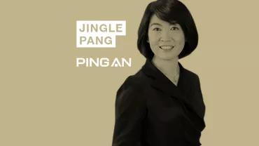 Person smiling in front of beige background with text: Jingle Pang Ping An.