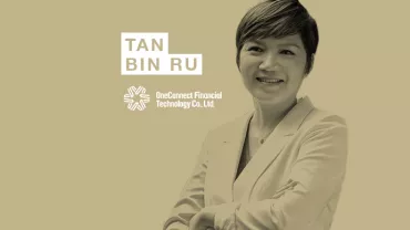 Person smiling in a white jacket, with logos and text on a beige background.