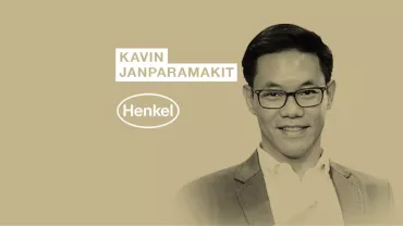 Individual smiling with Henkel logo and name displayed.
