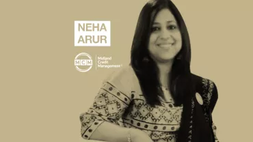 Smiling person in patterned attire, text beside reads 'Neha Arur', 'MCM', and 'Midland Credit Management'.