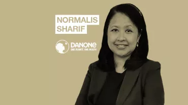 Person smiling with Danone logo and text 'Normalis Sharif'.