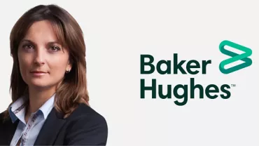 Person in business attire next to Baker Hughes logo on a white background.