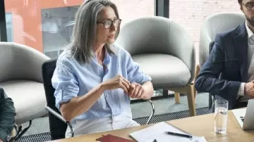 Group of people having a meeting in a modern office.