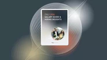 Cover of Italy 2024 Salary Guide and Hiring Insights with abstract design in background.