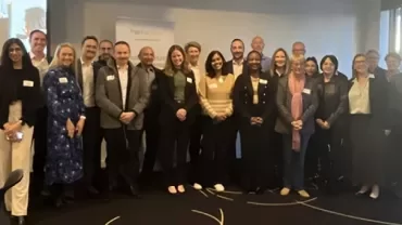 a group of people in a conference