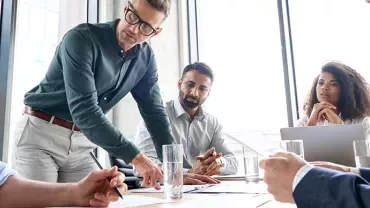 group of people working together in the office