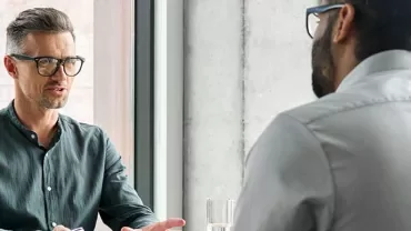 two men talking