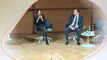 two people giving a conference 