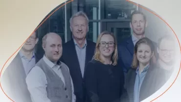 a group standing and smiling