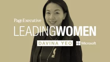 Individual smiling with 'Leading Women' text overlay.