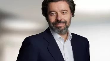 Person in a suit with a blurred background