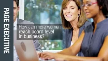 People discussing business strategies at a meeting table.