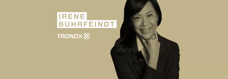 Person smiling in a professional portrait with name and Tronox logo displayed.