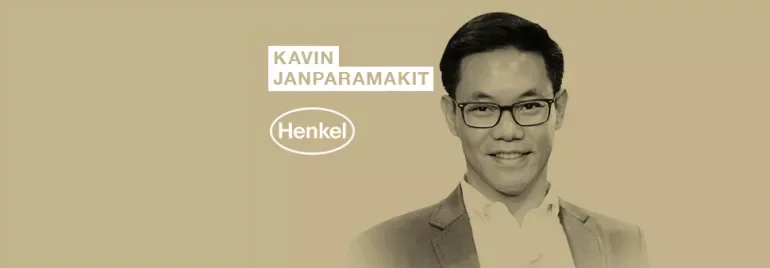 Individual smiling with Henkel logo and name displayed.