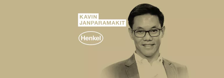Individual smiling with Henkel logo and name displayed.