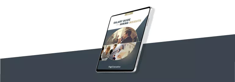 Tablet displaying a salary guide with hiring insights cover.