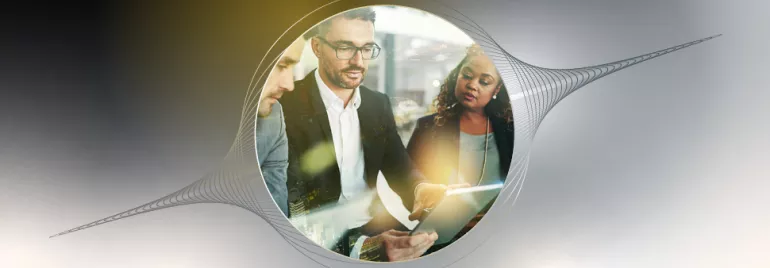 Group of professionals collaborating in an office setting.