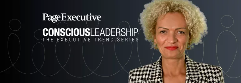 Individual smiling against a backdrop with 'Conscious Leadership' text.