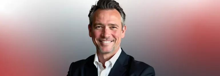 Peter Kitchin in a red-gray background 