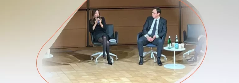 two people giving a conference 