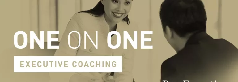Two people engaging in executive coaching