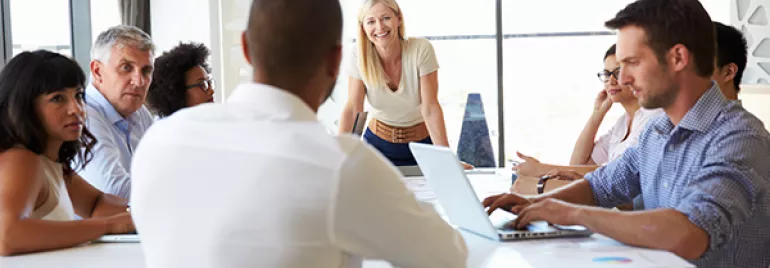 A group of professionals having a meeting in a modern office.
