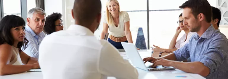 A group of professionals having a meeting in a modern office.