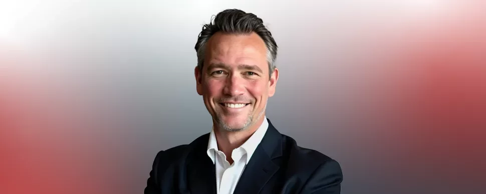 Peter Kitchin in a red-gray background