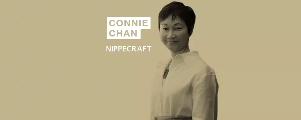 Person in a white shirt with short hair, text reads 'Connie Chan Nippecraft' on a beige background.