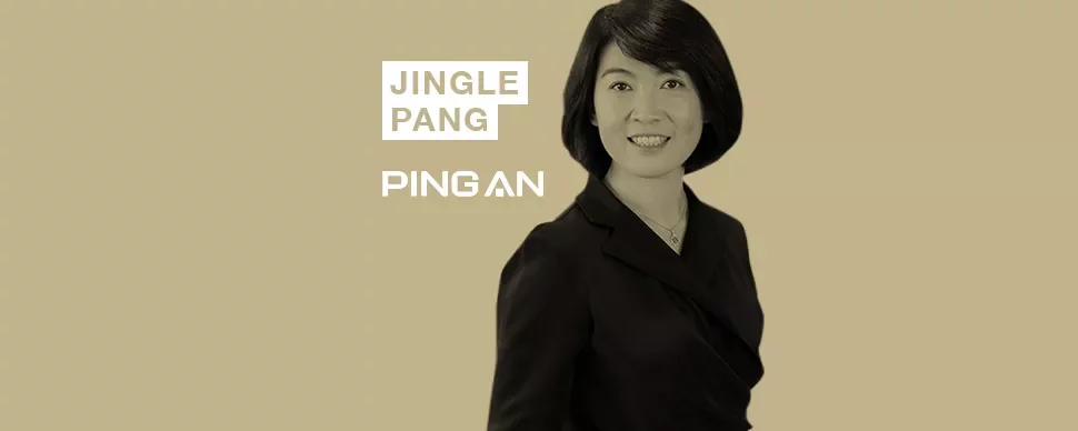 Person smiling in front of beige background with text: Jingle Pang Ping An.