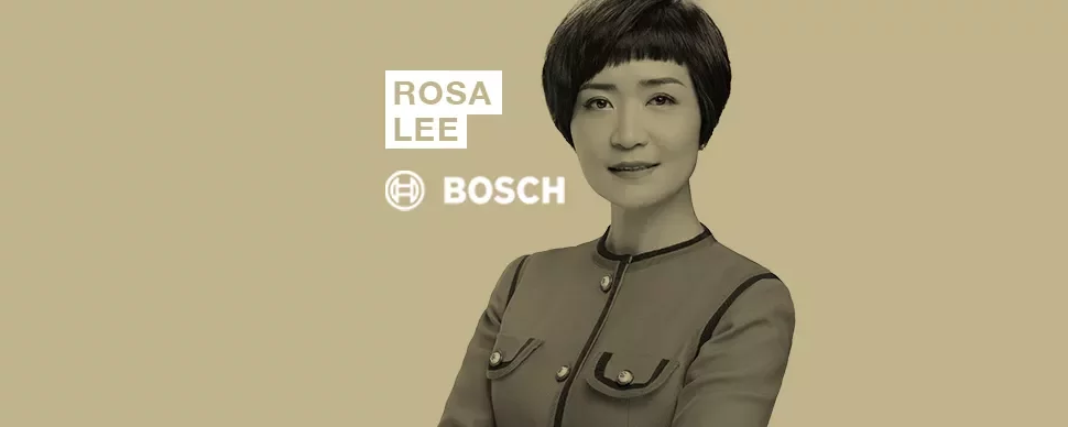 Person in business attire with a short hairstyle, next to the words 'Rosa Lee Bosch' on a beige background.