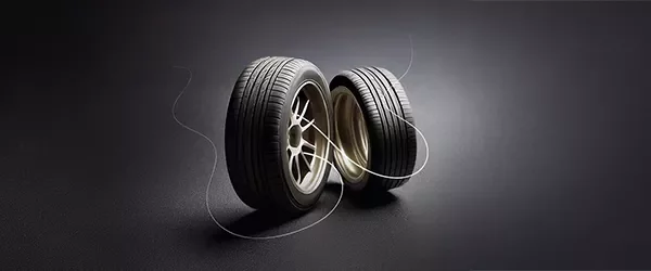 two wheels on a dark background