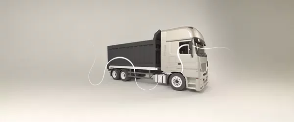Side view of a white truck with a black cargo container, set against a light background.